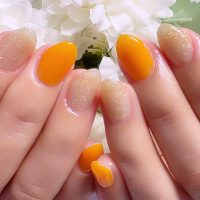 成増徒歩3分のフェイシャルエステ・ネイルサロン ビューティスタジオCenbless（センブレス）　透け感カラーで軽やかに 夏の手元に映えるオレンジ×イエローネイル