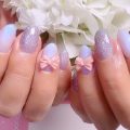 Cenbless　成増フェイシャル＆ネイルサロン　パールホワイト×クリアブルーラメ♪リボンパーツが可愛いバレンタインネイル